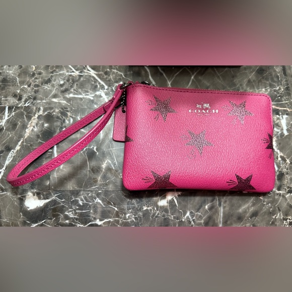 Coach Handbags - 💖 Coach wristlet in Barbie Core Pink 4x6 with sparkling stars 🌟